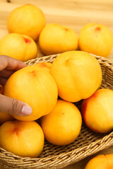 Fresh Golden Nectarines from Yimeng Mountain in Wicker Basket - Hand Picking Ripe Stone Fruit