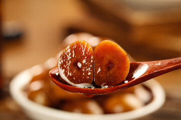 Soy Marinated Eggs with Garlic Sauce - Traditional Asian Side Dish on Wooden Spoon