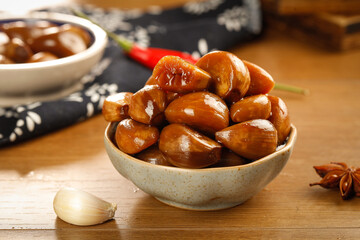 Chinese Preserved Dates in Bowl with Garlic and Spices Traditional Asian Cuisine Ingredients Guangxi Style