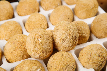 Raw Brown Potatoes with Natural Skin on White Paper Background for Cooking and Kitchen Use