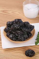 Air-dried Xinjiang Prunes in Wooden Bowl with Milk Glass - Chinese Dried Fruit Snack