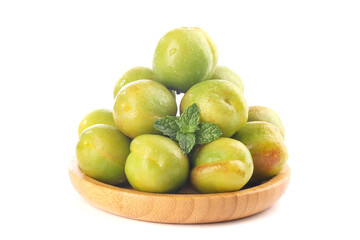 Fresh Green Pears and Apricots in Wooden Bowl with Mint Leaf Garnish