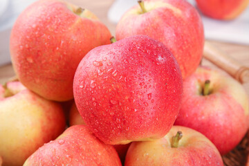 Fresh Red Aksu Fuji Apples from Xinjiang China with Water Droplets in Wooden Basket