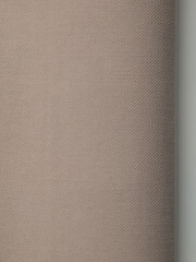 Dark dense fabric for sewing clothes, ironed, the texture of the fabric is visible