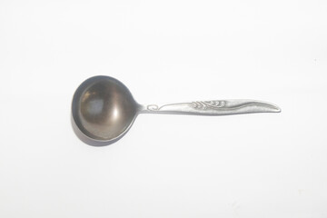 Close up of aluminum ladle isolated on white background.Copy space for text.For graphic design and...