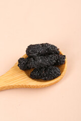 Dried Black Mulberries from Xinjiang on Wooden Spoon - Wild Harvested Superfood Berries