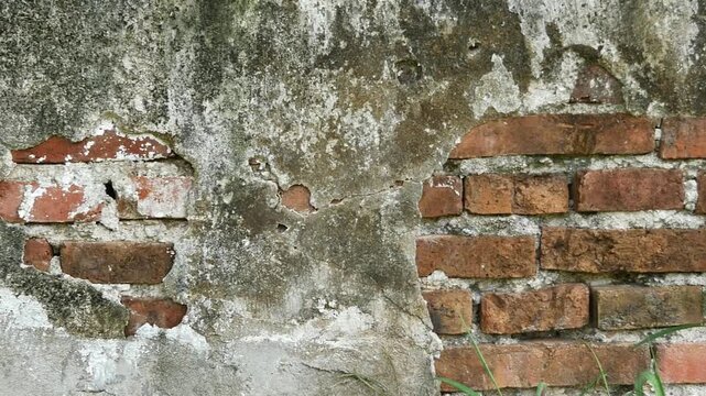 Old, peeling, dirty cement walls.