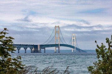 Scenic view of Mackinac Bridge on a cloudy day.