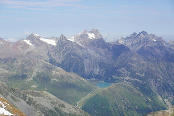 Obraz premium The panorama of Rifflesee lake in the the Alps opening from Schwarze Schneid mountain, the Austrian Alps