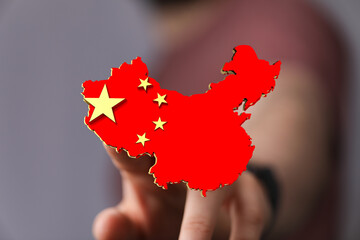 High-quality 3D render of a person holding a China map. Perfect for business, travel, or geography...
