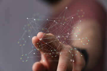 High-tech image depicting a hand interacting with a digital network. Ideal for technology, connectivity, and innovation concepts.