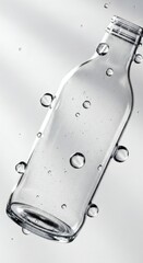 Clear glass bottle with water droplets floating gracefully in the air. Perfect for beverage or spa product promotions.