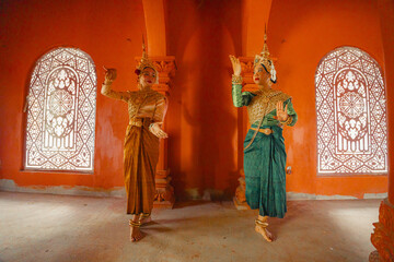 Traditional Khmer apsara dancers perform at a pagoda in Tra Vinh province, Vietnam
