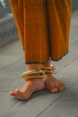 Khmer apsara traditional dance performer foot gesture at a pagoda in Tra Vinh province, Vietnam