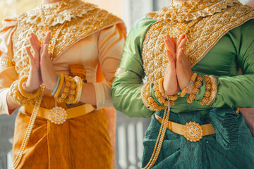 Khmer apsara traditional dance performer hand gesture at a pagoda in Tra Vinh province, Vietnam