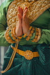 Khmer apsara traditional dance performer hand gesture at a pagoda in Tra Vinh province, Vietnam