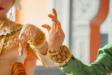 Khmer apsara traditional dance performer hand gesture at a pagoda in Tra Vinh province, Vietnam