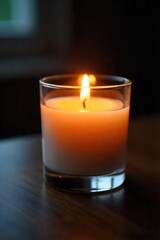 A single flickering candle in a glass votive, casting a warm, inviting glow Perfect for adding ambiance to any space, ideal for meditation, relaxation, or romantic settings , flickering, evening
