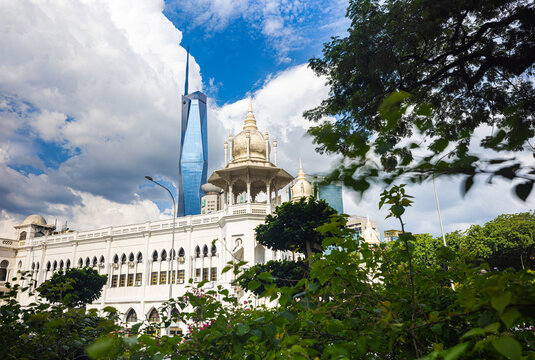 Kuala Lumpur, Malaysia &ndash; 16 September 2025: Time Lapse Footage at Kuala Lumpur Railway Station (KTM), Moorish-revival arches in front, with Merdeka 118 rising behind, framed by greenery and clouds. 