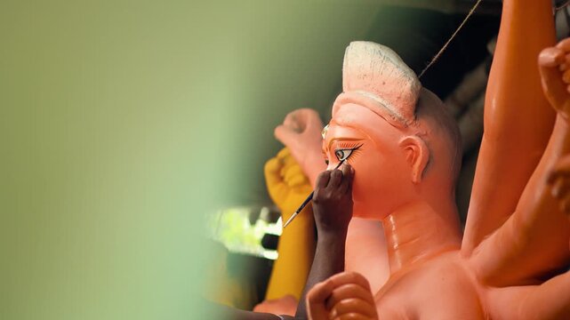 Making of Goddess Durga Idol Eye Painting in Kumartuli for Durga Puja, the biggest festival of Kolkata, West Bengal