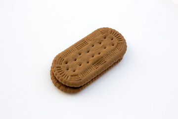 A sweet wafer filled with chocolate cream isolated on white background. Perfect for a sweet snack or tasty dessert.