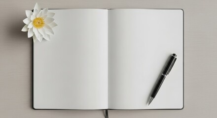 Open notebook with a white flower and black pen showcasing a blank page perfect for stationery and branding projects