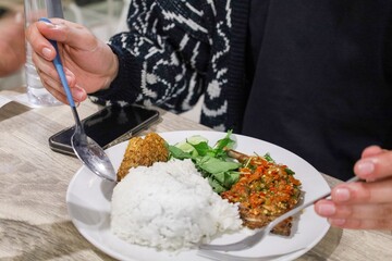 Close Up Authentic Ayam Geprek Indonesian Cuisine Food on Plate