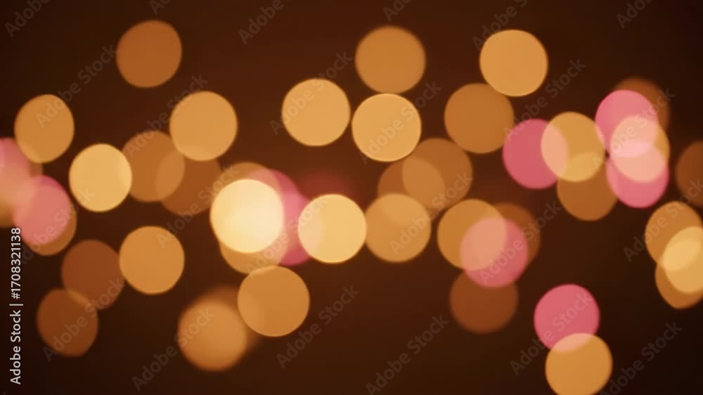 Wall mural a soft seamlessly looping video displays glowing bokeh light spheres drifting and blurring, creating