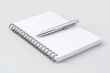 Blank spiral-bound notebook and pen on a light gray surface (1)