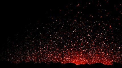 Fiery texture background with burning hot flames and glowing sparks on dark black backdrop, detailed close-up with intense heat effect for energy, fire, explosion, and dramatic abstract design.