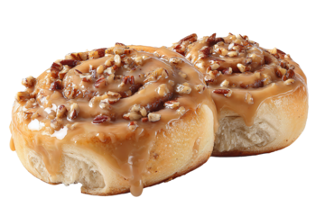 Cinnamon pastries glazed with caramel and sprinkled with pecans, warm glossy highlights over flaky texture, isolated on transparent background.
