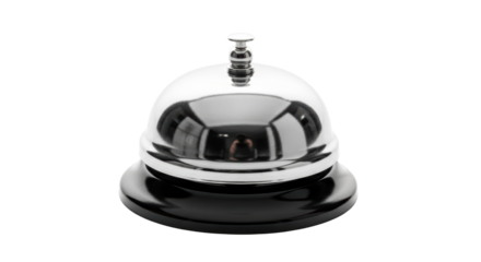 Isolated chrome plated metal service call bell with black base on seamless backdrop