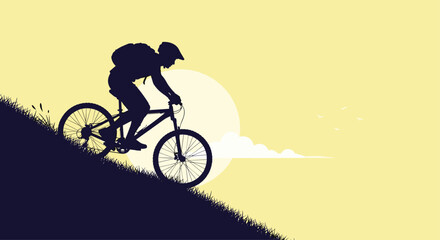 Obraz premium Silhouette of a cyclist riding a mountain bike uphill during sunset.