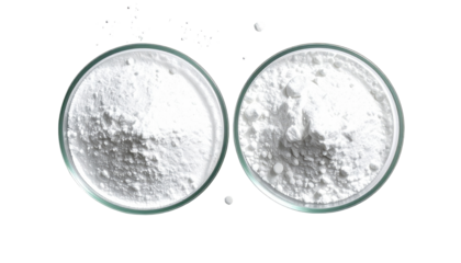 Two clear glass dishes holding white powder