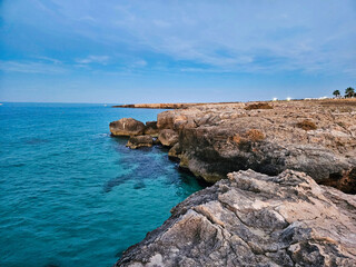 Jete  biarritz. The medieval bastion. Rocky coast of the sea. Blue ocean scenery. Coast of the sea. The marine rocks landscape. View of the coast of the region sea. Popular spot for tourists.