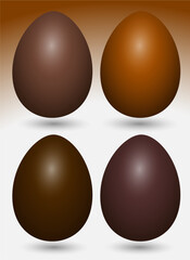 Four chocolate eggs in different shades of brown, a delicious Easter treat.