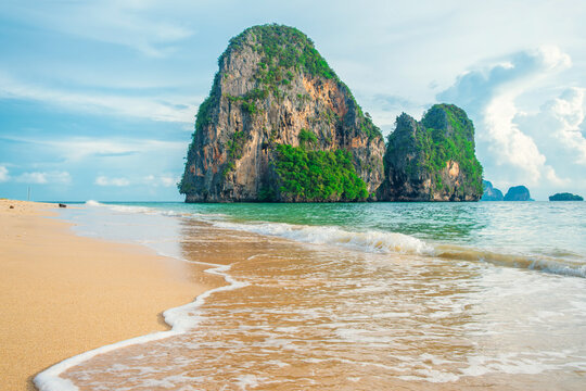 Phra Nang sandy beach with Ko Rang Nok rocky island with nobody, Railay Bay, Krabi, Thailand. Popular touristic vacation holiday destination