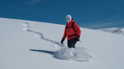 kicking up fresh snow
