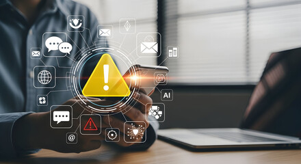 Businessman using digital tablet with holographic security alert icons and notifications in modern office environment for technology cybersecurity concept