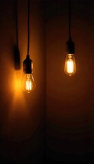 Warm, glowing light bulbs illuminate a dark room, casting soft shadows on the walls  Perfect for home decor, interior design, and lighting concepts , soft shadows, bulbs