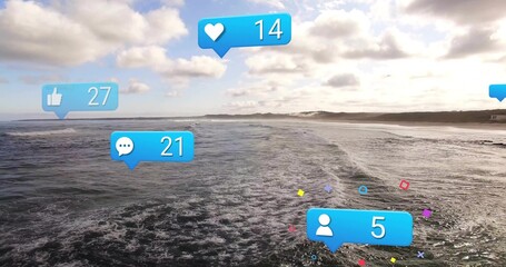 Fototapeta premium Displaying rolling ocean waves at beach, featuring bright blue social media engagement icons