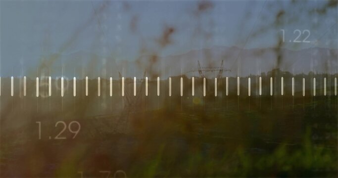 Featuring semi-transparent slider graphic spanning grassland with steel pylons and numeric ticks