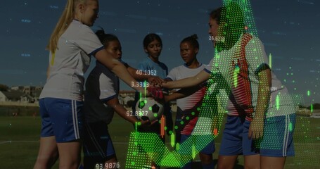Huddling soccer players wearing jerseys stacking hands over ball on grass field, with chart overlay