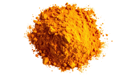 Turmeric powder pile against black background