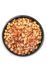 Mixed nuts seeds legumes in black bowl - healthy protein snack combo with soybeans peanuts grains on white background