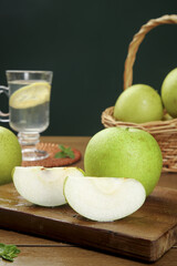 Fresh Green Pears on Wooden Board with Basket - Healthy Organic Fruit Still Life