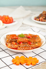 Braised Sea Cucumber in Spicy Sauce Traditional Asian Seafood Dish with Vegetables