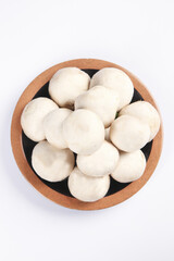 Fresh White Button Mushrooms in Wooden Bowl on White Background Top View
