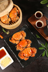 Steamed Yangcheng Lake Hairy Crabs Closeup Display with Traditional Chinese Tea Service