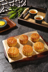 Traditional Chinese Mooncakes with Lotus Seed Paste and Egg Yolk for Mid-Autumn Festival Celebration